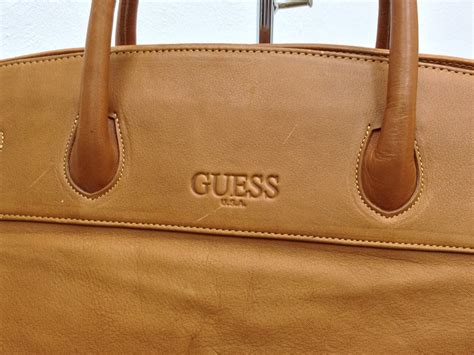 are guess purses real leather.